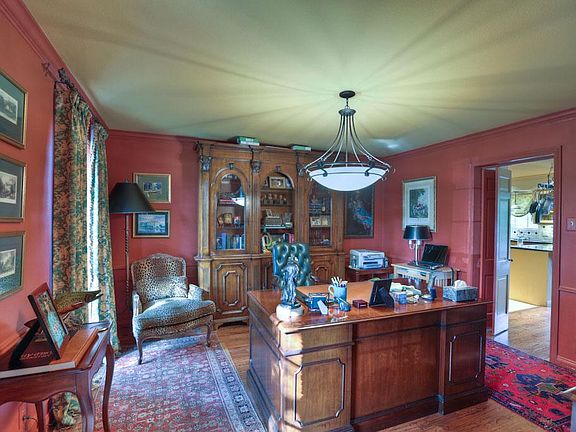This room was originally used as a dining space, but has been formed to a spacious home office measu