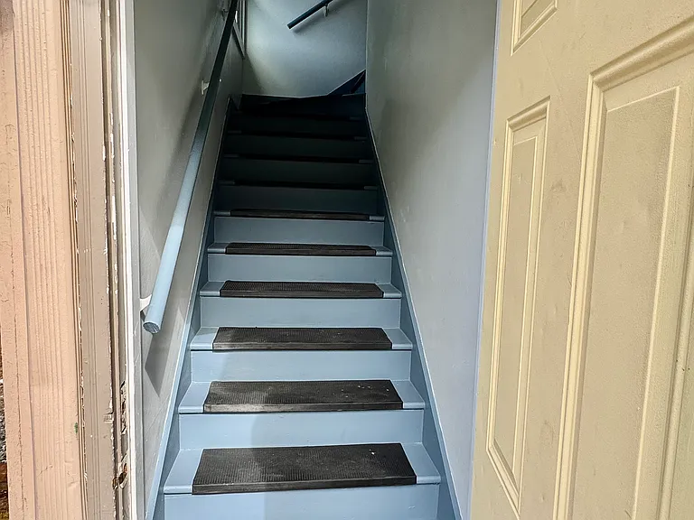 Stair entrance to Unit B from the back of the house
