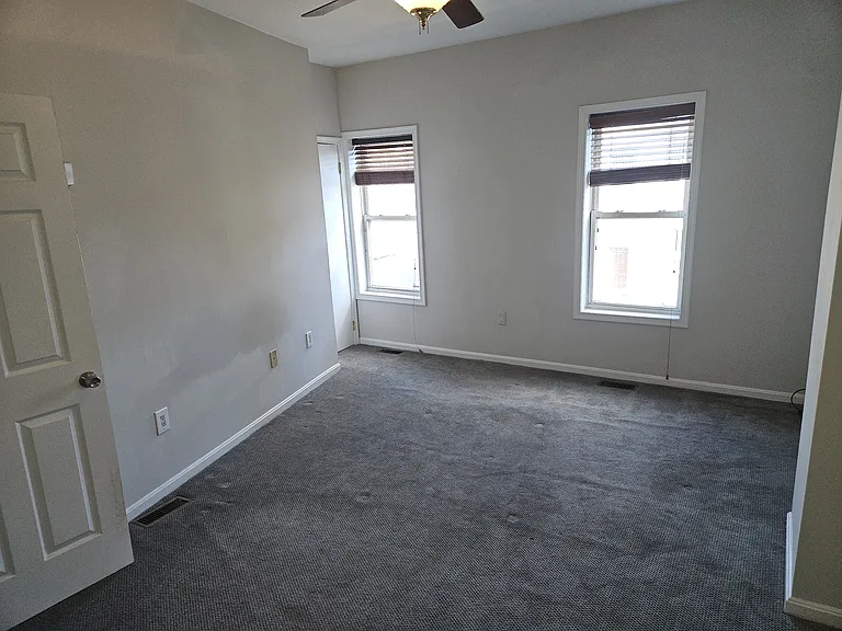 Master bedroom that gets plenty of morning light.