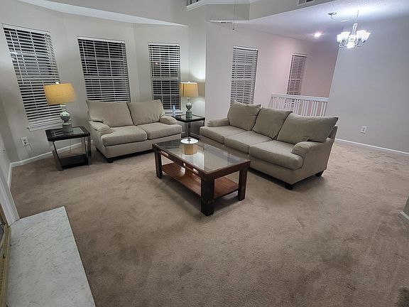 Fully furnished common room living area with mounted 55in samsung smart tv
Fire place not in use.