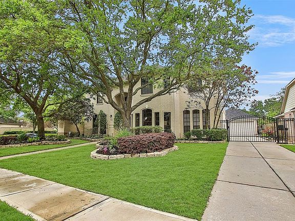 A gated driveway provides extra security and a touch of class to this Trendmaker home!