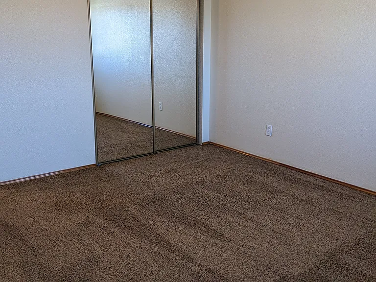 Primary bedroom with 2 closests