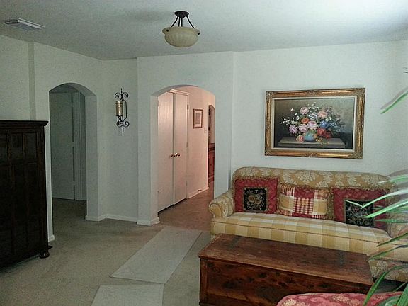 Living Room as you enter the home. Note the archways.
