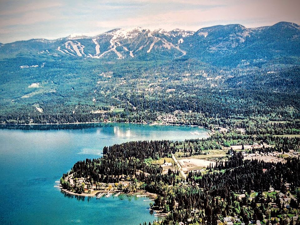 Bay Point on Whitefish Lake with the ski resort in the background