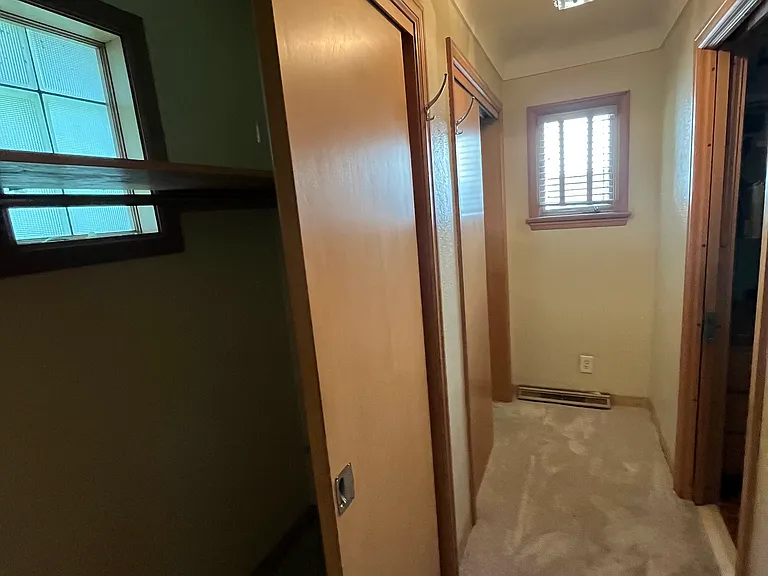 master bedroom closets leading into bathroom