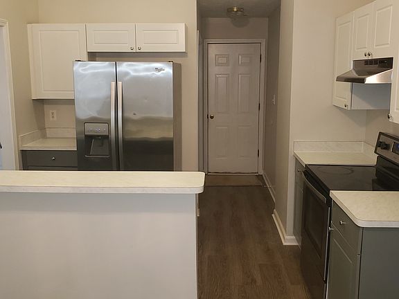 Updated kitchen with stainless steel appliances.