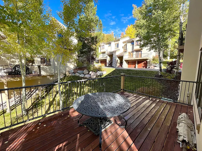 Large wrap around deck with sweeping east-west mountain views