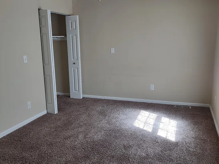 Bedroom with Ceiling Fan and Natural Light Bedroom with Ceiling Fan and Natural Light