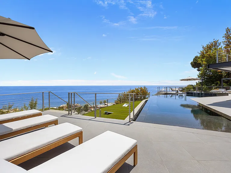 Experience the epitome of outdoor comfort with soft cushions and stylish decor.