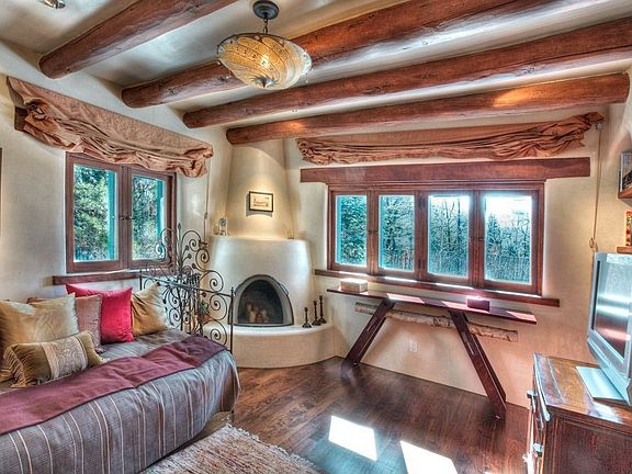 At the end of a short hallway off the main foyer is the oldest portion of the residence. It now comp