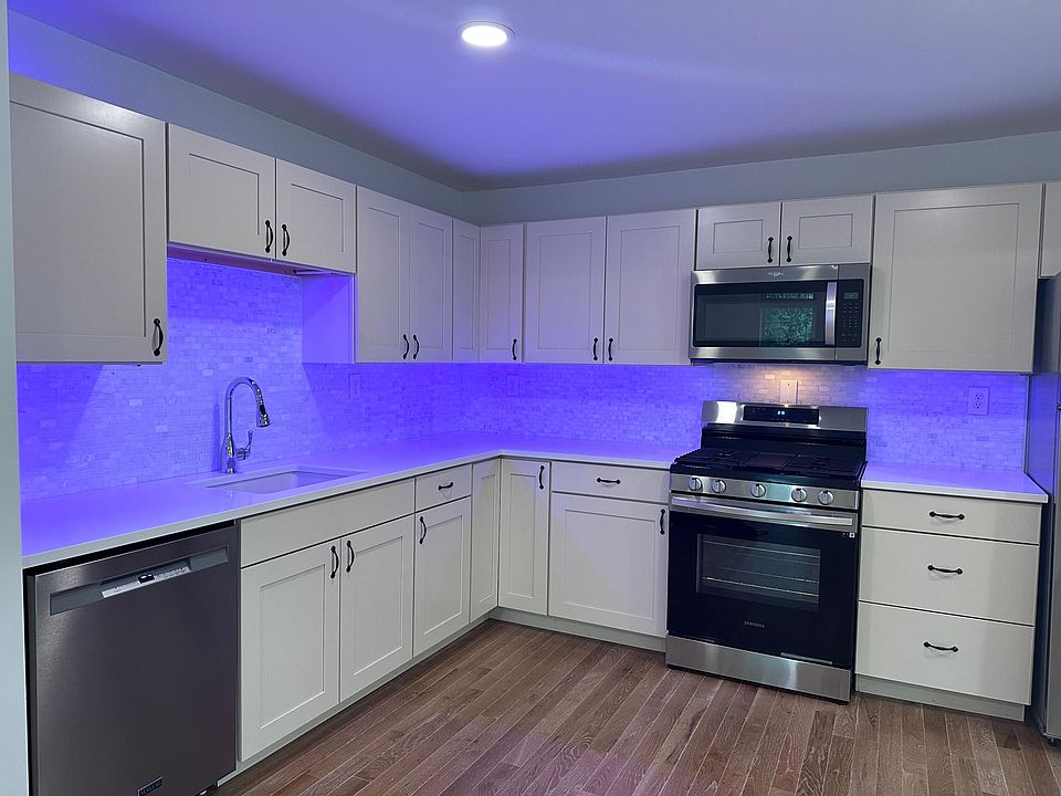 Very large kitchen. Stainless steel appliances. Lots of counter and cabinet space.