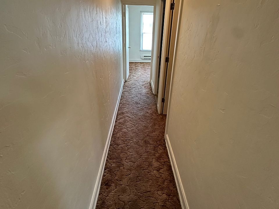 hallway to bath, bedroom and walk-in closet