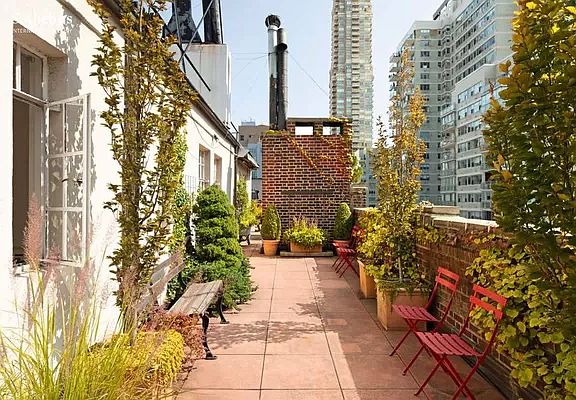 2nd image of 129 E 69th St Penthouse A