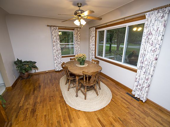 The bright dining area (17x11) with large window leads you into the kitchen.