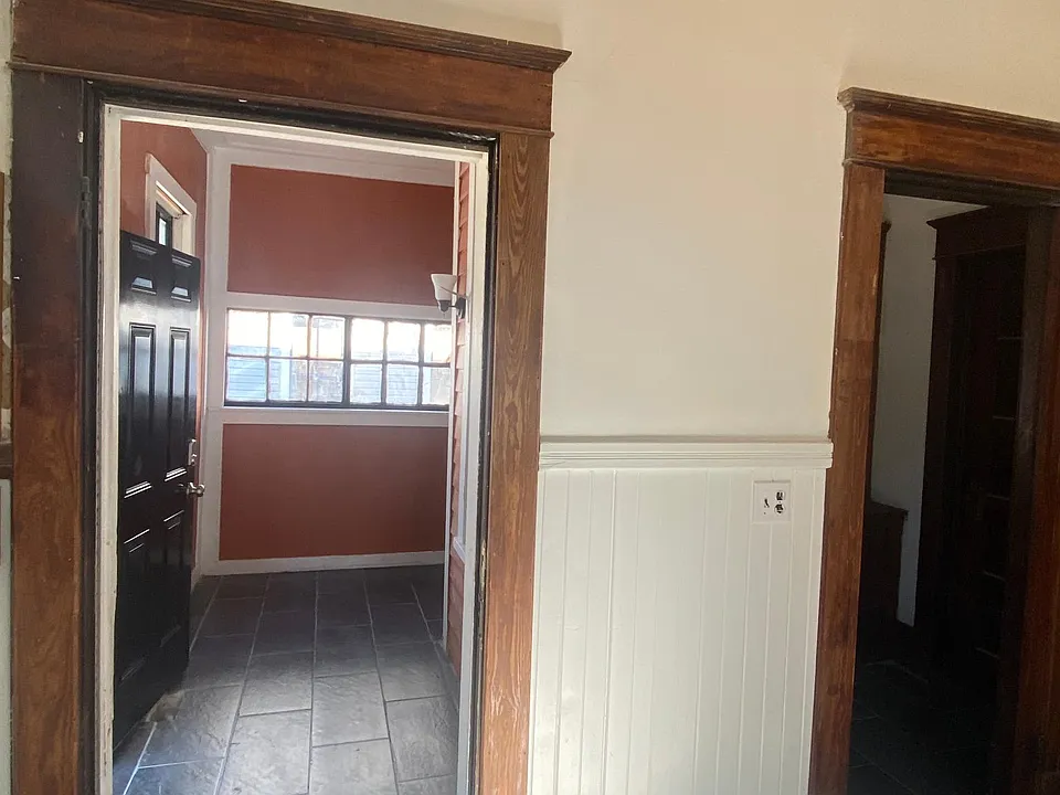 Kitchen, mud room, and rear door