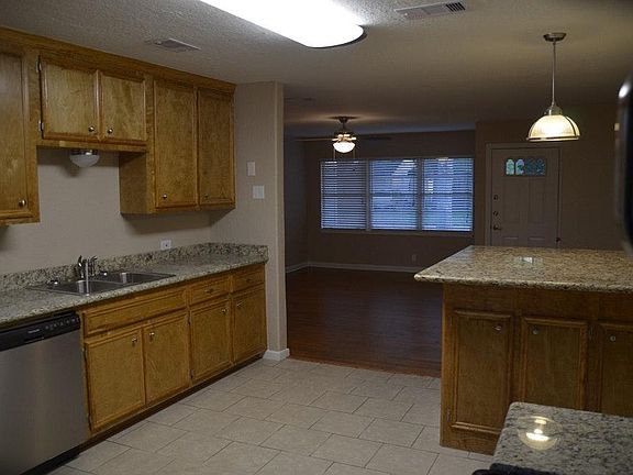 Kitchen looking at living room