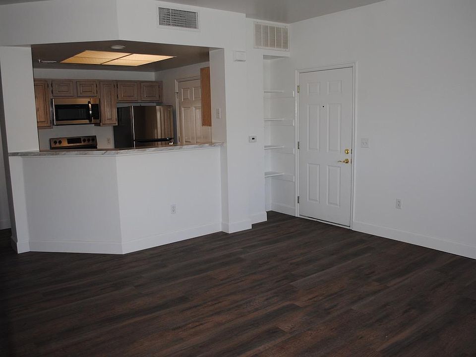 Living Room / Entry/ Open Kitchen. Note: the only stainless applicance is the microwave
