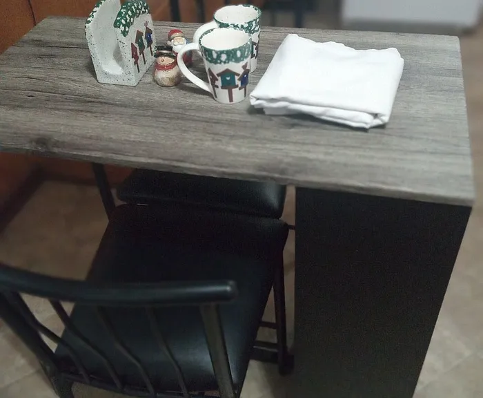 Two seater, sturdy table.