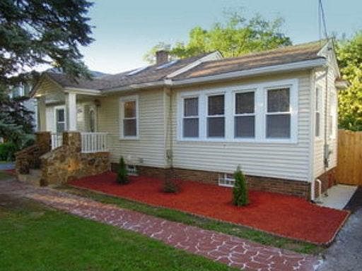 Front of house, master bedroom