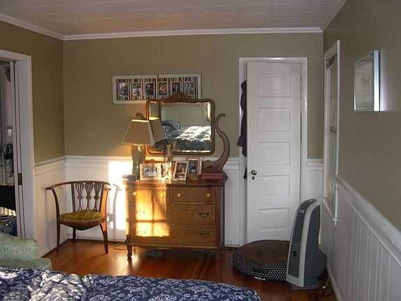 Bright,master bedroom with harwood floors