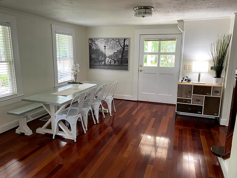 Dining room and entrance - notice the "Coffin Door" from the early 1900's