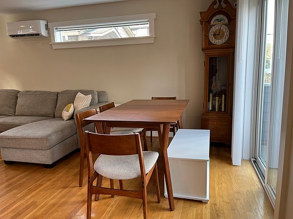 Main floor (2nd floor) - Currently we use this space for dining, but only because we use the dining area for a kids play area. This space is versatile and leads to a glass slider out to a balcony.
