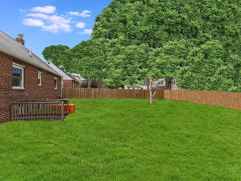 Huge completely fenced rear yard that is very private and surrounded by trees