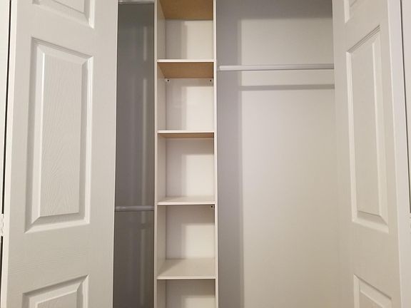 Large Bedroom Closet and Shelf (Basement)