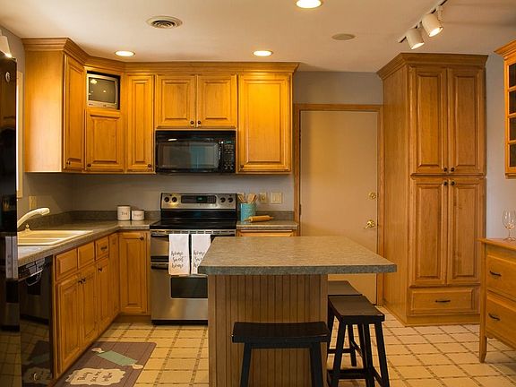 Eat in kitchen opens to front dining/sitting room.