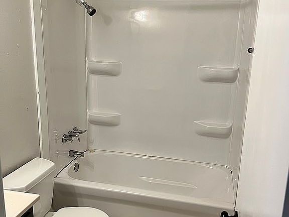 New tub & surround & faucet 