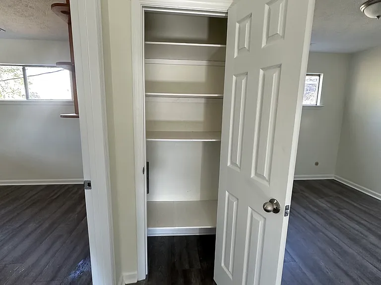 Upstairs closet between bedrooms