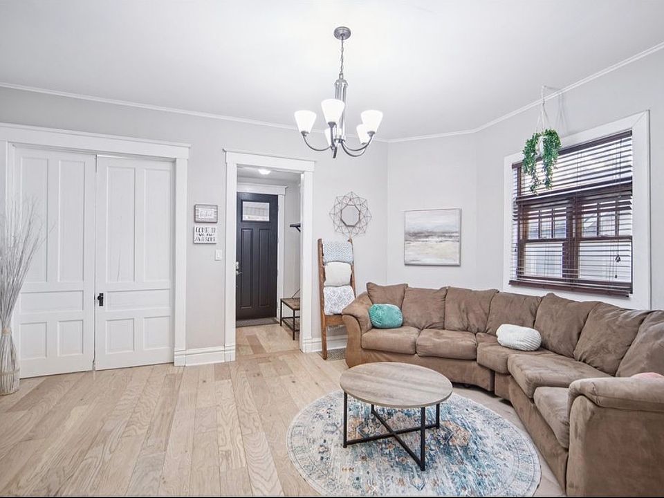 Living area with view of front entryway