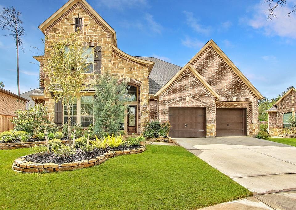 Great curb appeal and with custom stone accents welcomes you and your guests.
