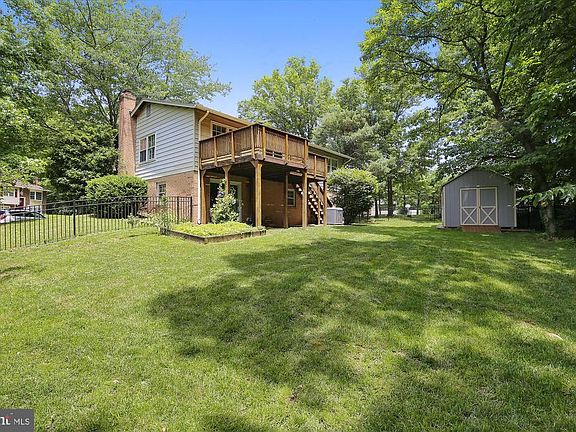 BACK YARD WITH NEWER SHED, FULLY FENCED