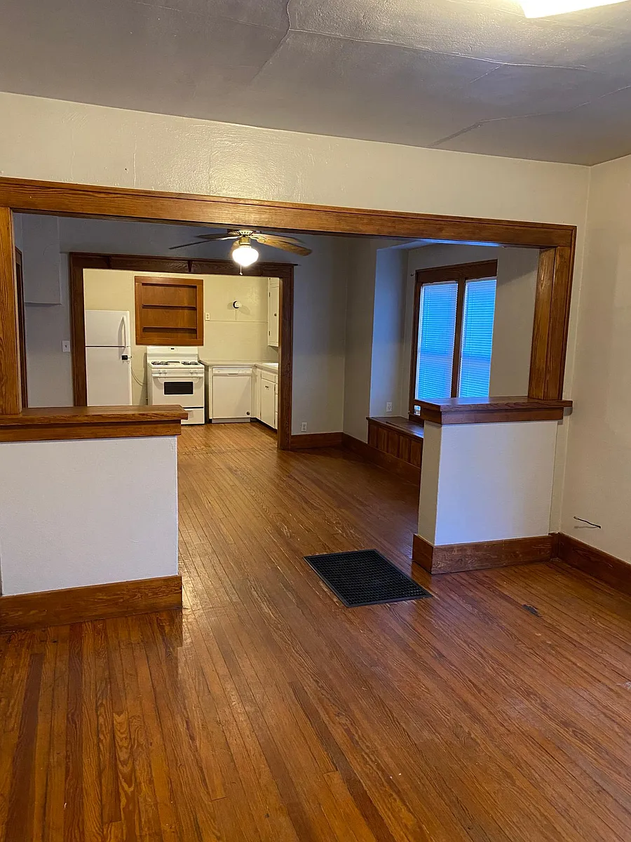 Living area view from front door. - 210 S Lowry St