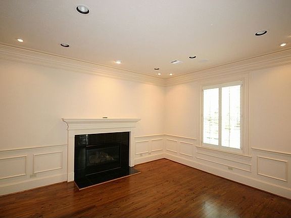 Formal Parlor (16 x 14) A more formal setting with fireplace of black marble s
