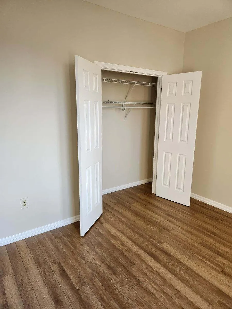bedroom with closet and hanging rack - 1727 N 42nd St