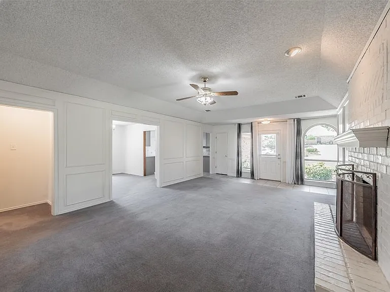 ANOTHER VIEW OF THE LIVING ROOM