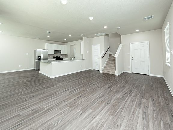 Family Room to Kitchen and Dining Area
