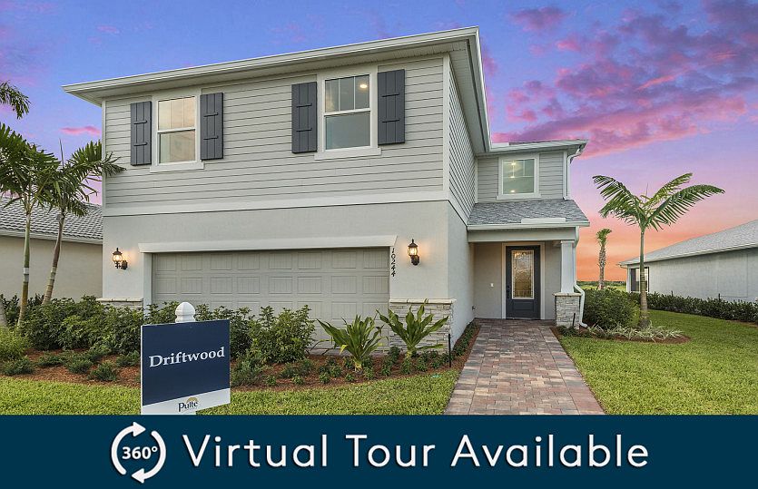 The Driftwood, a two-story home with a 2 car garage, shown with Home Exterior C2A
