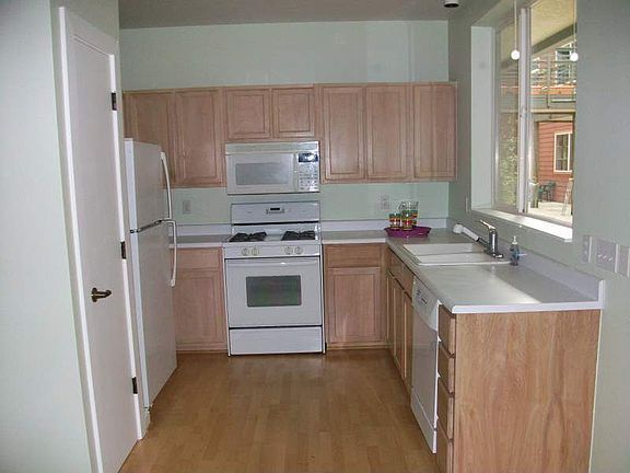 All appliances are included in the roomy, open kitchen w/ plenty of cupboards