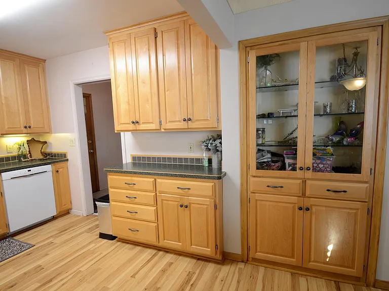 Custom cabinetry with built-in hutch to display mementos