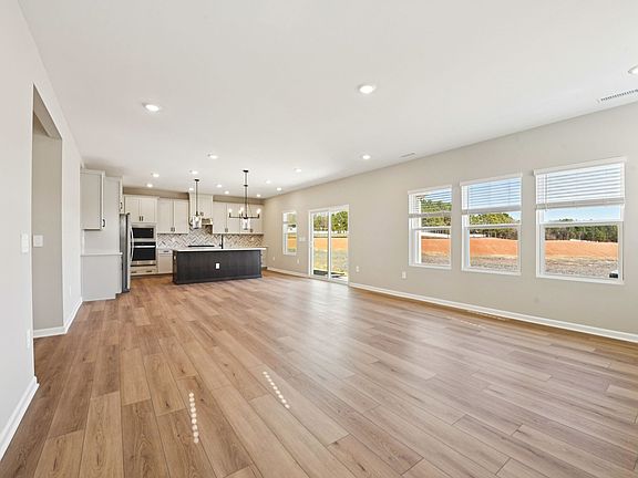 Great room in the Taylorsville floorplan at a Meritage Homes community in Raleigh, NC.