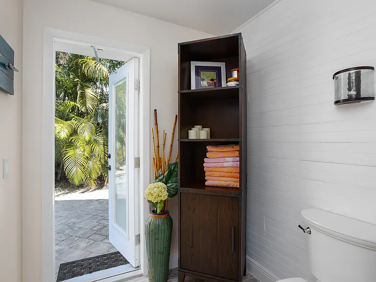 Primary Bath leads to the pool deck.