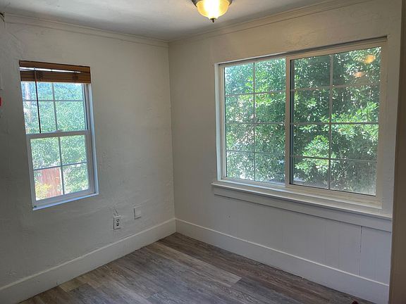 Spacious eating area or light filled home office space