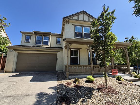 Front of house with two car garage
