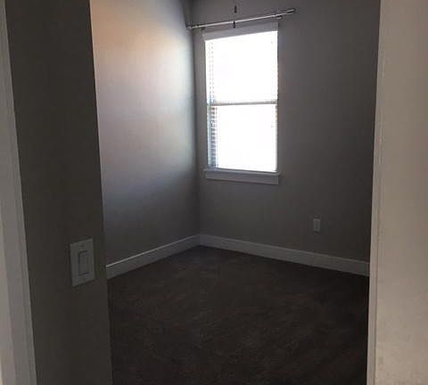 One of two upstairs bedrooms (3 bedrooms total)