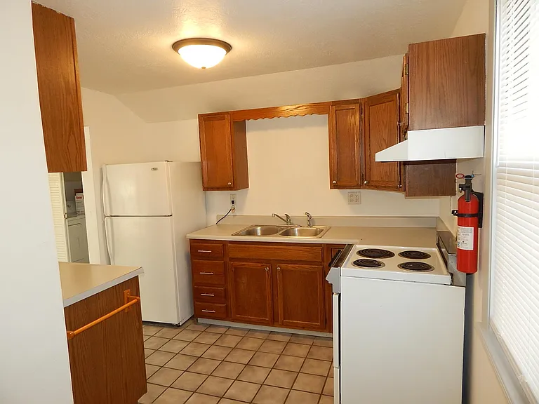 Upstairs Unit Kitchen view 1