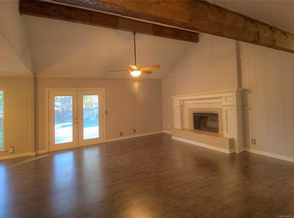 Large fireplace and new flooring.