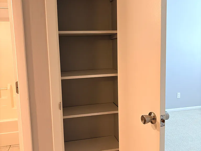 Linen closet outside of hall bath and 2nd bedroom